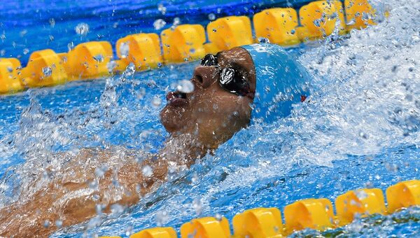 Российский пловец Евгений Рылов на XXXI летних Олимпийских играх в финальном заплыве на 200 м на спине во время соревнований по плаванию среди мужчин на XXXI летних Олимпийских играх
