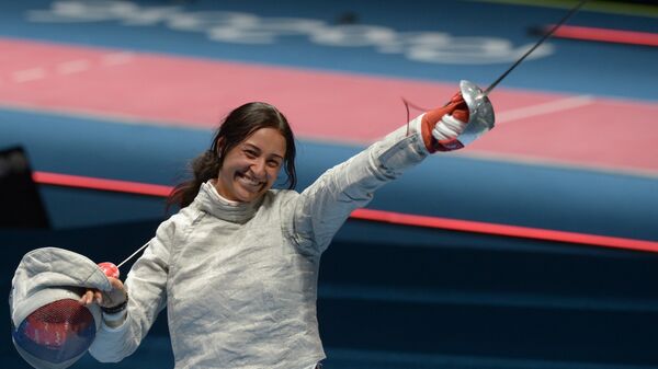 Яна Егорян (Россия) после полуфинального поединка командного первенства по фехтованию на саблях среди женщин против команды США на XXXI летних Олимпийских играх