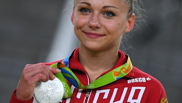 Мария Пасека, завоевавшая серебряную медаль в опорном прыжке на XXXI летних Олимпийских играх