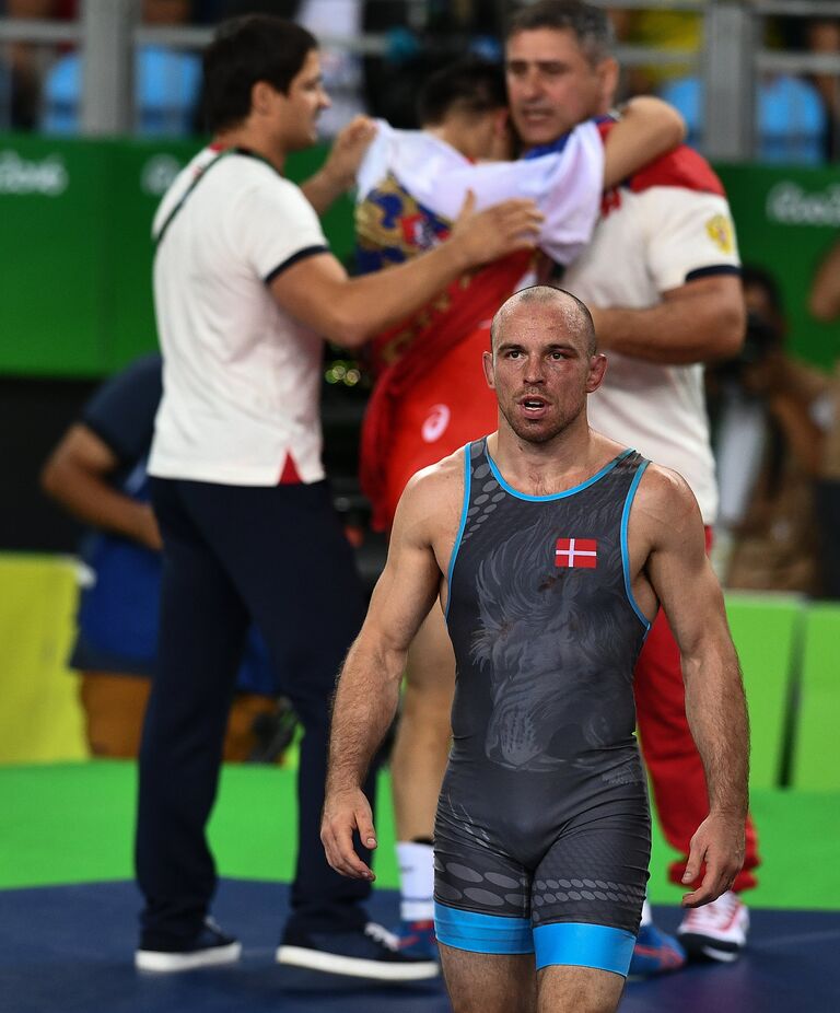 Марк Мадсен (Дания), проигравший Роману Власову (Россия) в поединке за первое место на соревнованиях по греко-римской борьбе в весовой категории до 75 кг на XXXI летних Олимпийских играх.