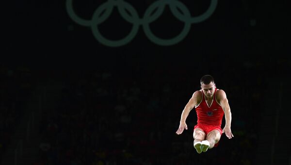 Россиянин Андрей Юдин в финале соревнований по прыжкам на батуте на XXXI летних Олимпийских играх