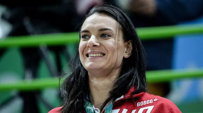 Елена Исинбаева во время матча 1/4 финала по гандболу между сборными России и Анголы на XXXI летних Олимпийских играх