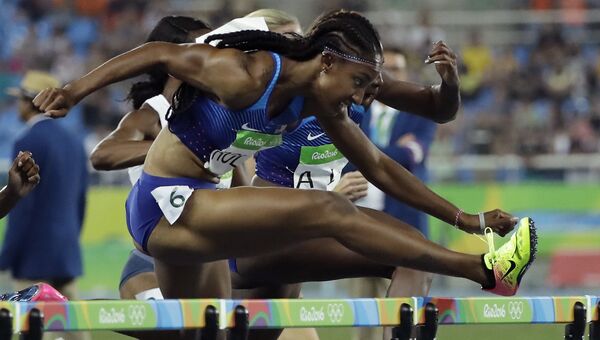 Американка Брианна Роллинс завоевала золотую медаль в беге на 100 метров с барьерами на Олимпиаде. 17 августа 2016 год