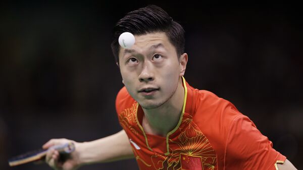 Китайский спортсмен Ма Лун во время турнира по настольному теннису на Олимпийских играх в Рио-де-Жанейро