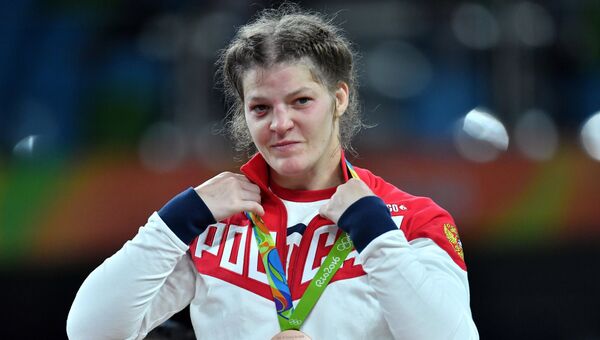 Екатерина Букина, завоевавшая бронзовую медаль в соревнованиях по вольной борьбе на XXXI летних Олимпийских играх