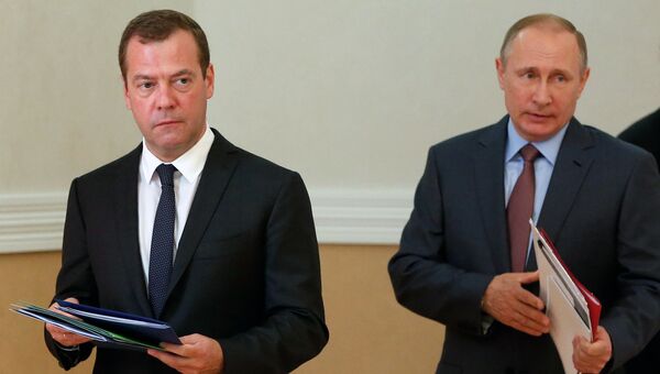 Президент России Владимир Путин и председатель правительства России Дмитрий Медведев. Архивное фото