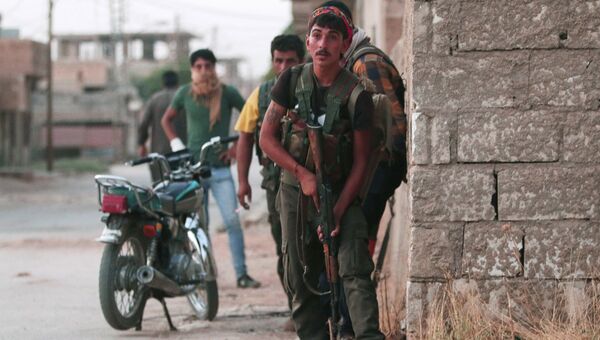 Боевик курдского отряда. Архивное фото