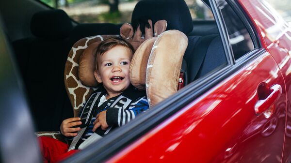 Ребенок в автомобиле. Архивное фото