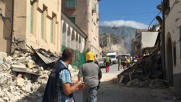 Дома в городе Аматриче, разрушенные в результате землетрясения