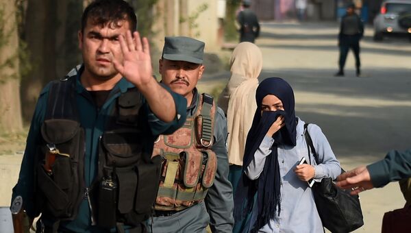 Полиция на месте взрыва у американского университета в Кабуле, Афганистан. 25 августа 2016.