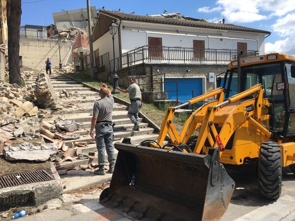 Дома в городе Аматриче, разрушенные в результате землетрясения