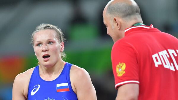Инна Тражукова в поединке за третье место соревнований по вольной борьбе среди женщин в весовой категории до 63 кг на XXXI летних Олимпийских играх.