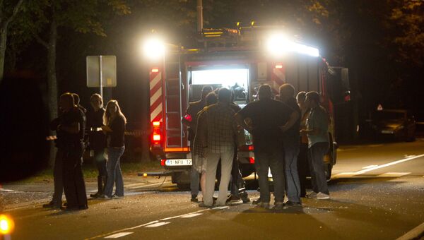 Спасатели на месте взрыва у спортивного центра в городе Шиме на юго-западе Бельгии