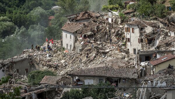 Разрушенные в результате землетрясения дома в итальянском городе Пескара-дель-Тронто. 24 августа 2016