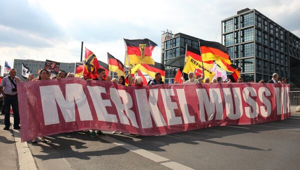 Акция протеста против политики Ангелы Меркель в Берлине. Архивное фото