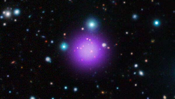 Древнейшее и самое далекое от нас скопление галактик CL J1001+0220 в созвездии Секстанта