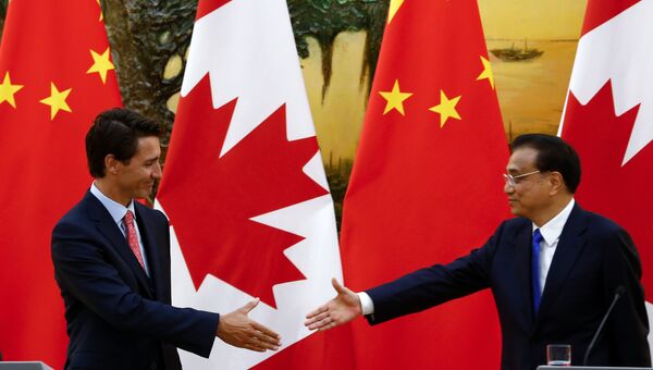 Премьер-министр Канады Джастин Трюдо и премьер Госсовета КНР Ли Кэцян в Пекине. 31 августа 2016