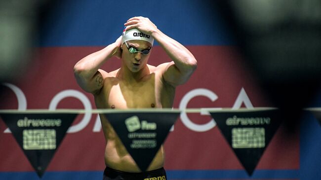 Владимир Морозов (Россия) на дистанции 50 метров на спине среди мужчин на этапе Кубка мира FINA по плаванию в Москве Владимир Морозов (Россия) на дистанции 50 метров на спине среди мужчин на этапе Кубка мира FINA по плаванию в Москве