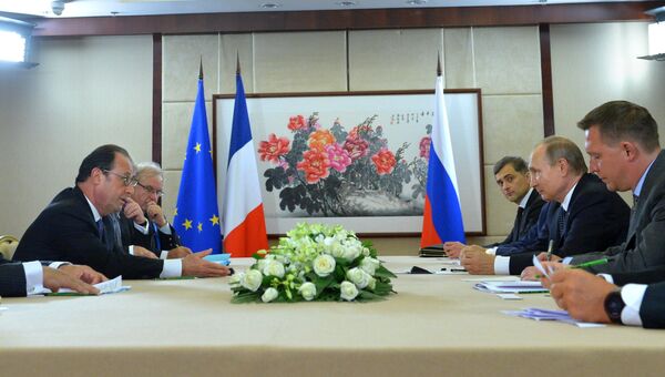 Президент РФ Владимир Путин и президент Франции Франсуа Олланд во время встречи в рамках саммита Группы двадцати G20 в Ханчжоу
