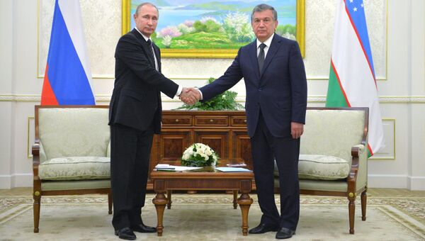 Президент РФ Владимир Путин и Шавкат Мирзиёев. Архивное фото