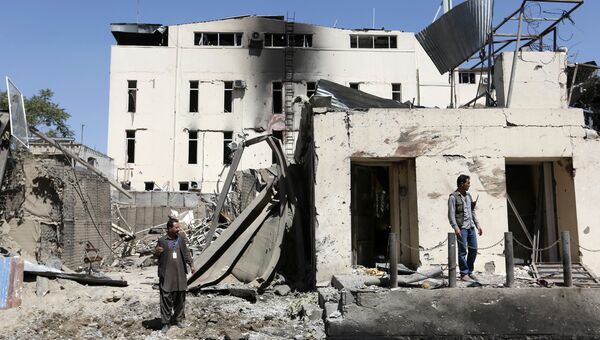 Место взрыва автомобиля у здания гуманитарной организации CARE в Кабуле, Афганистан. Архивное фото