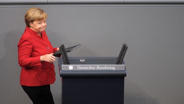 Канцлер ФРГ Ангела Меркель перед выступлением в бундестаге. Архивное фото