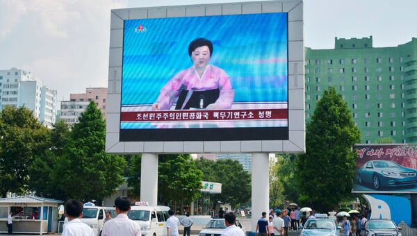 Новостное сообщение о пятом ядерном испытании на уличном экране Пхеньяна, Северная Корея. 9 сентября 2016