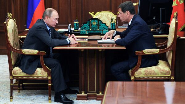 Президент РФ Владимир Путин и глава Олимпийского комитета России Александр Жуков во время встречи в Кремле. 14 сентября 2016