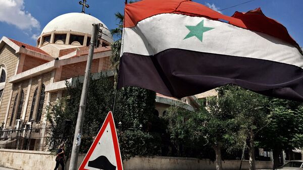 Государственный флаг Сирийской Арабской Республики. Архивное фото