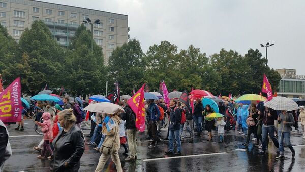 Участники акции протеста против TTIP в Берлине