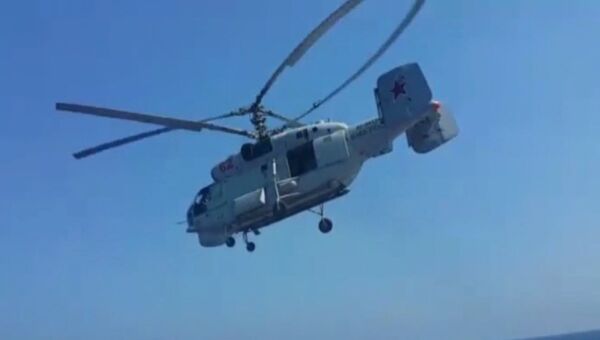 Вертолеты Ка-27 и Z-9C барражировали над морем на российско-китайских учениях