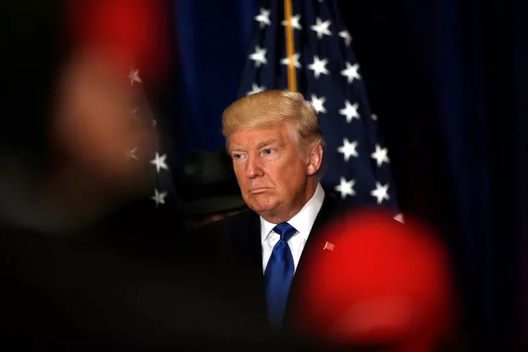 Кандидат в президенты США от Республиканской партии Дональд Трамп во время пресс-конференции в Вашингтоне. Сентябрь 2016 года Кандидат в президенты США от Республиканской партии Дональд Трамп во время пресс-конференции в Вашингтоне. Сентябрь 2016 года