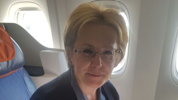 Министр здравоохранения России Вероника Скворцова в салоне самолета