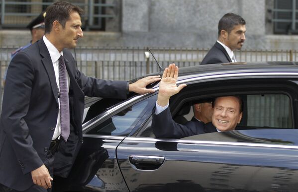 Сильвио Берлускони после посещения судебного заседания в Милане. 19 сентября 2011