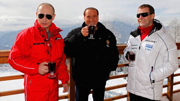 Владимир Путин, Сильвио Берлускони и Дмитрий Медведев на горнолыжном курорте Красная Поляна