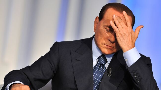 Сильвио Берлускони на итальянском телевидении. Архивное фото