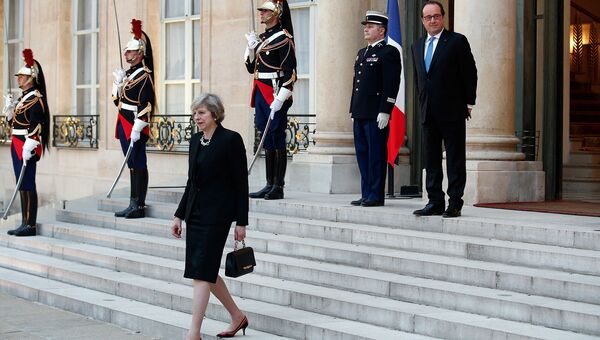 Британский политик Тереза Мэй и президент Франции, политический и государственный деятель Франсуа Олланд