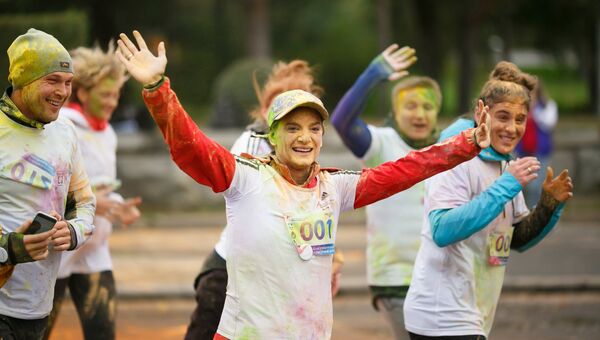 Двукратная олимпийская чемпионка в прыжках с шестом, член комиссии атлетов МОК Елена Исинбаева во время благотворительного красочного забега в Волгограде