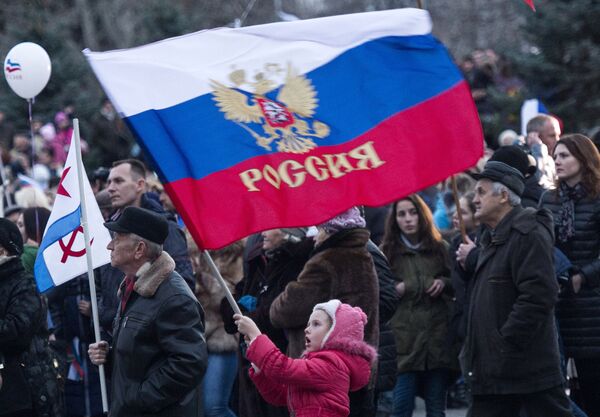Участники праздничных мероприятий, посвященных годовщине Крымской весны Участники праздничных мероприятий, посвященных годовщине Крымской весны