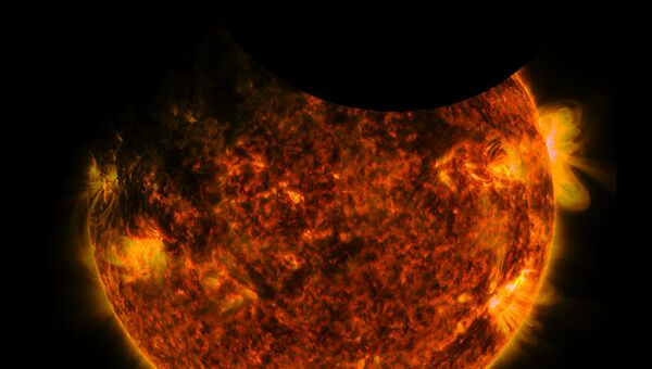 Двойное затмение солнца на снимке Обсерватории солнечной динамики NASA