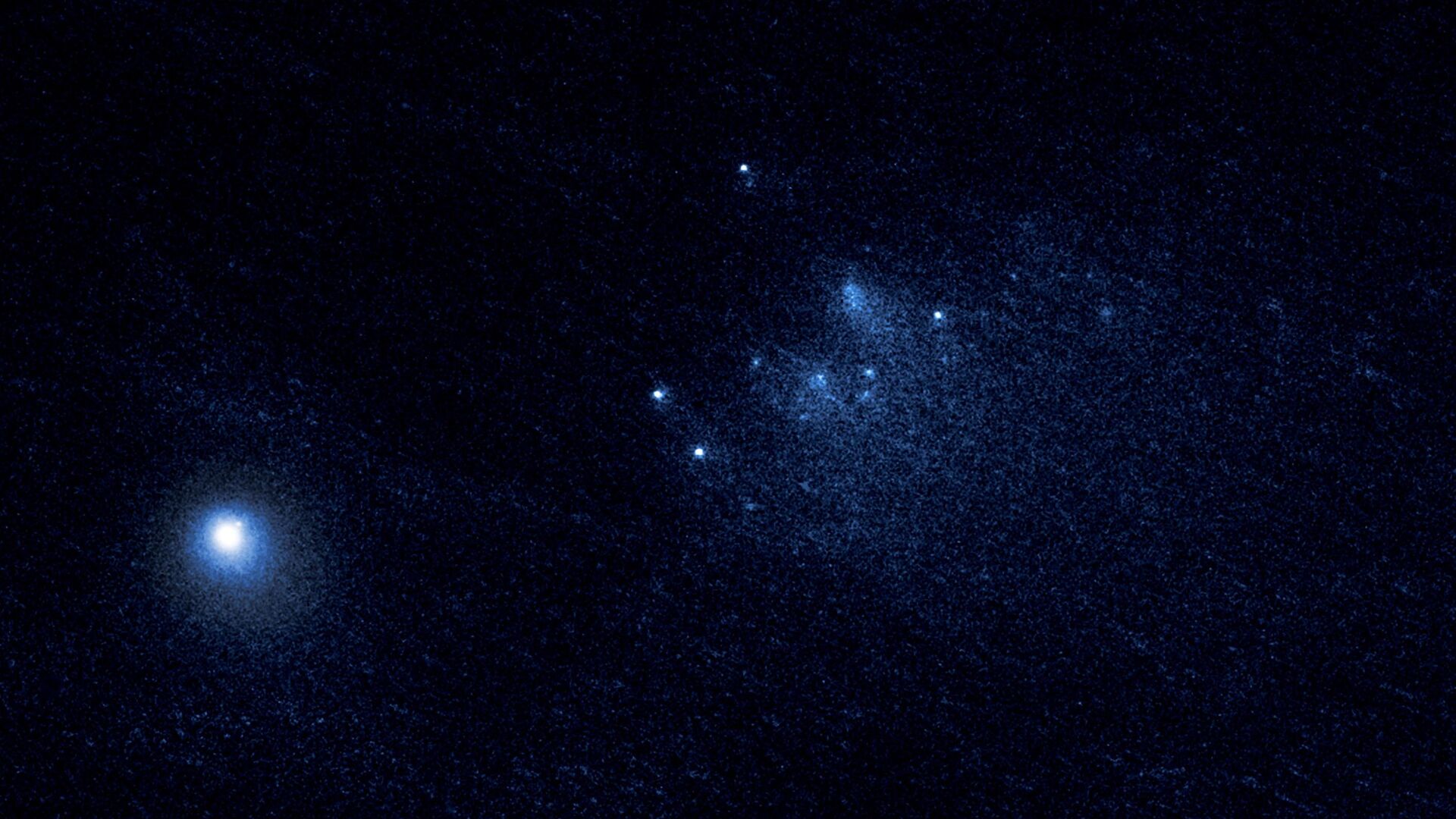 Снимок Хаббла, запечатлевший комету 332P/Икея-Мураками, распавшуюся на части  - РИА Новости, 1920, 24.07.2021