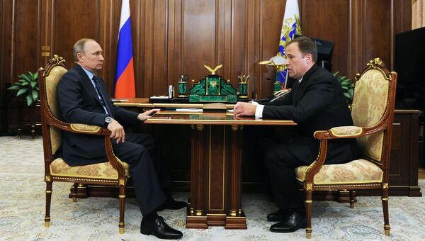 Владимир Путин и Игорь Комаров. Архивное фото