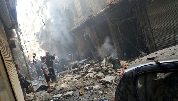 Последствия минометного обстрела христианского квартала Мидан в Алеппо