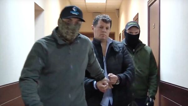 Стоп-кадр с оперативного видео задержания украинца Роман Сущенко