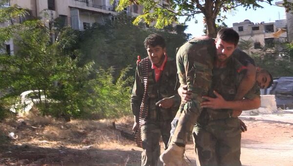 Бойцы сирийской армии во время наступления на позиции боевиков Джебхат-ан-Нусра (организация запрещена в РФ) в восточном квартале Алеппо