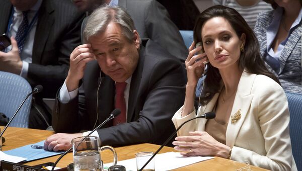 Посол доброй воли ООН Анджелина Джоли и португальский политик Антонио Гутерреш
