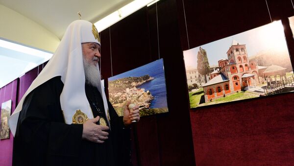 Патриарх Кирилл на фотовыставке. Архивное фото