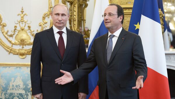 Президент России Владимир Путин и президент Франции Франсуа Олланд. Архивное фото