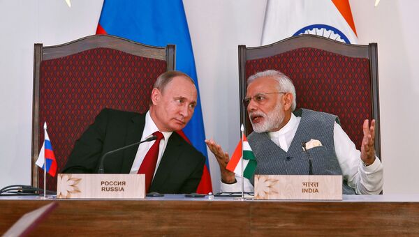 Президент РФ Владимир Путин и премьер-министр Республики Индии Нарендра Моди после переговоров в рамках саммита БРИКС