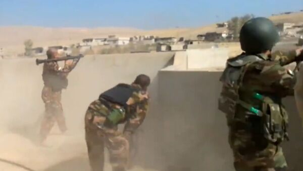 Наступление на Мосул: кадры сражения курдов с боевиками ИГ в Хазире